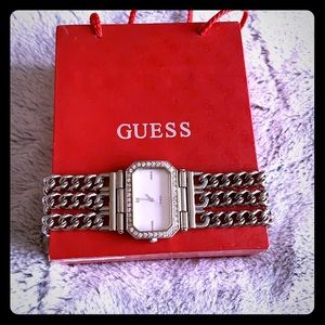 Women’s Guess watch with rhinestone detail